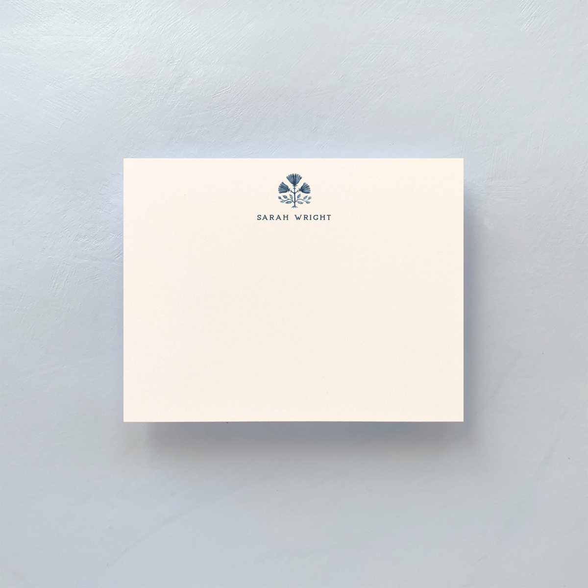 Notecard with blue and white pattern and envelope