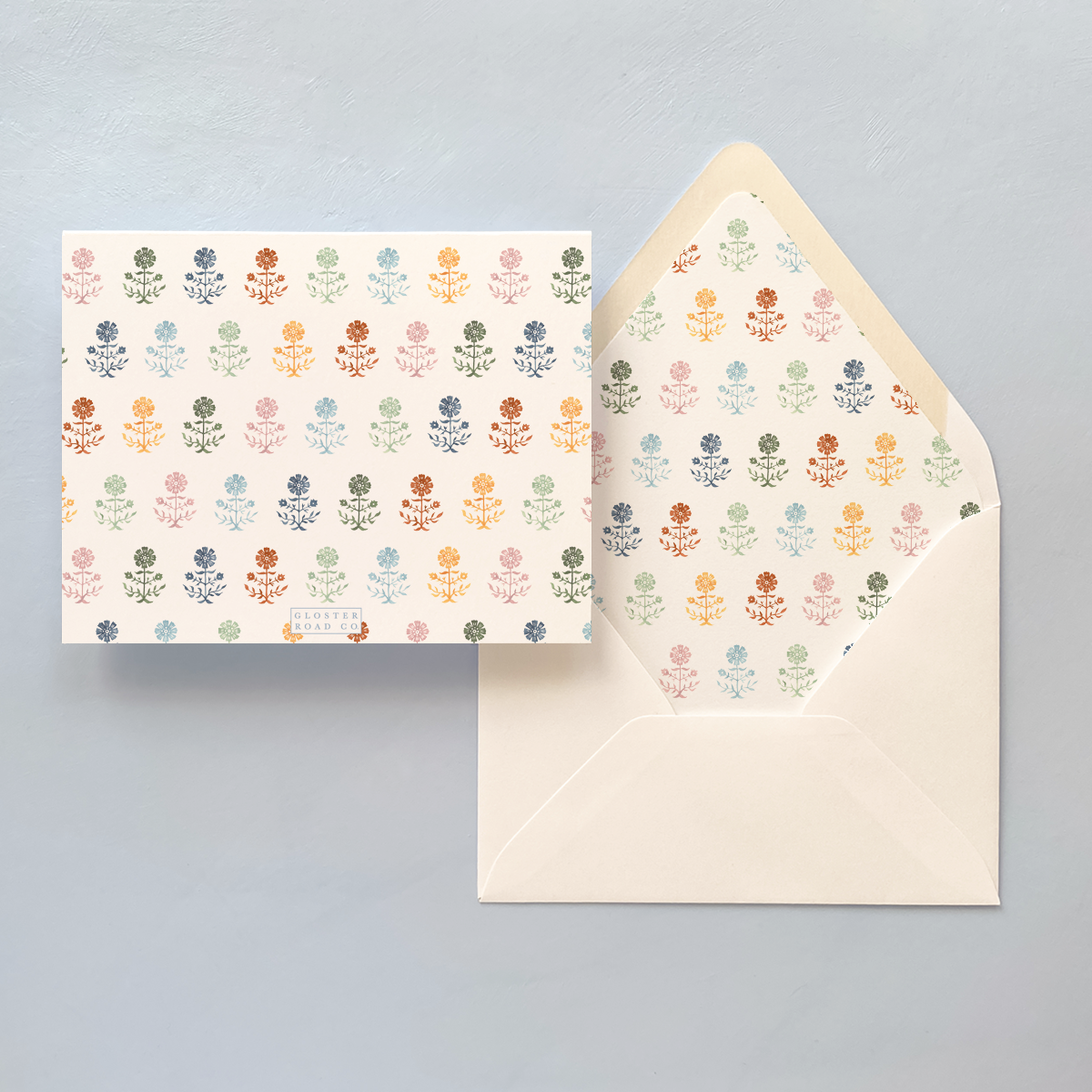Folded notecard with Gerbera multicolored pattern and envelope