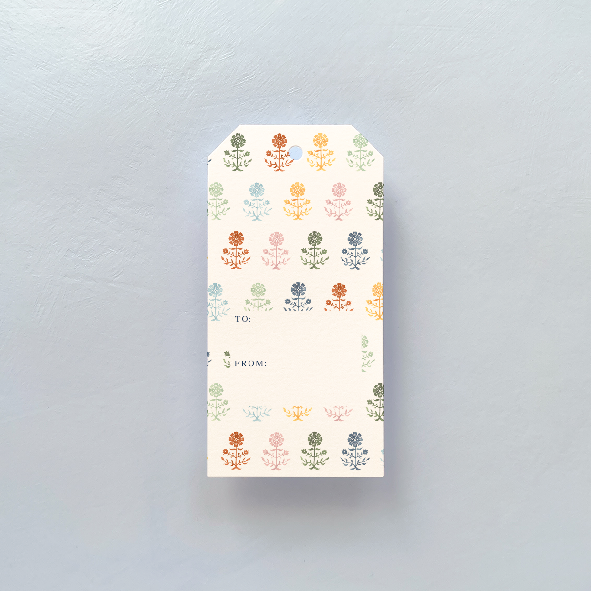 GIFT TAG WITH MULTI COLORED GERBERA PATTERN