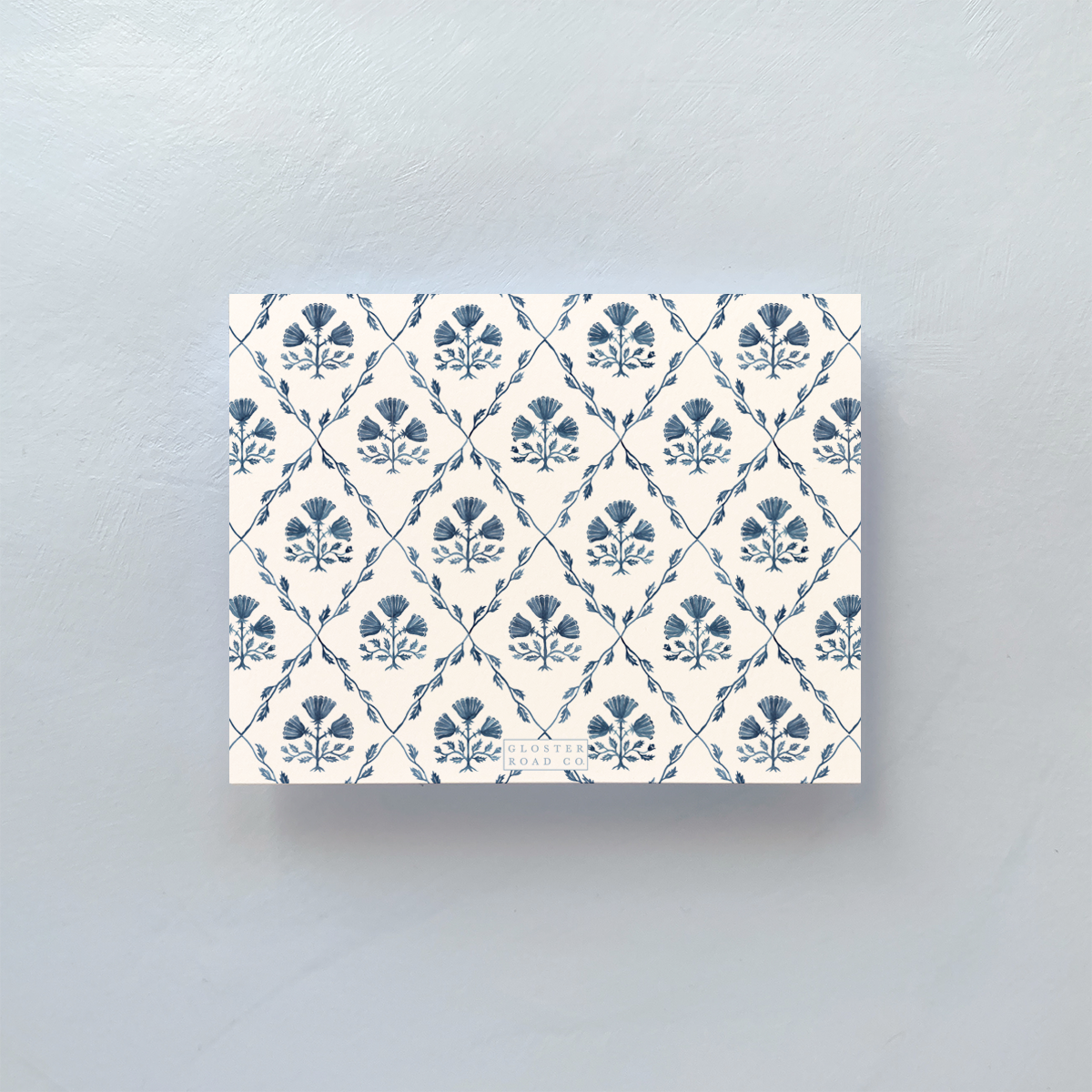 Notecard with blue and white pattern and envelope