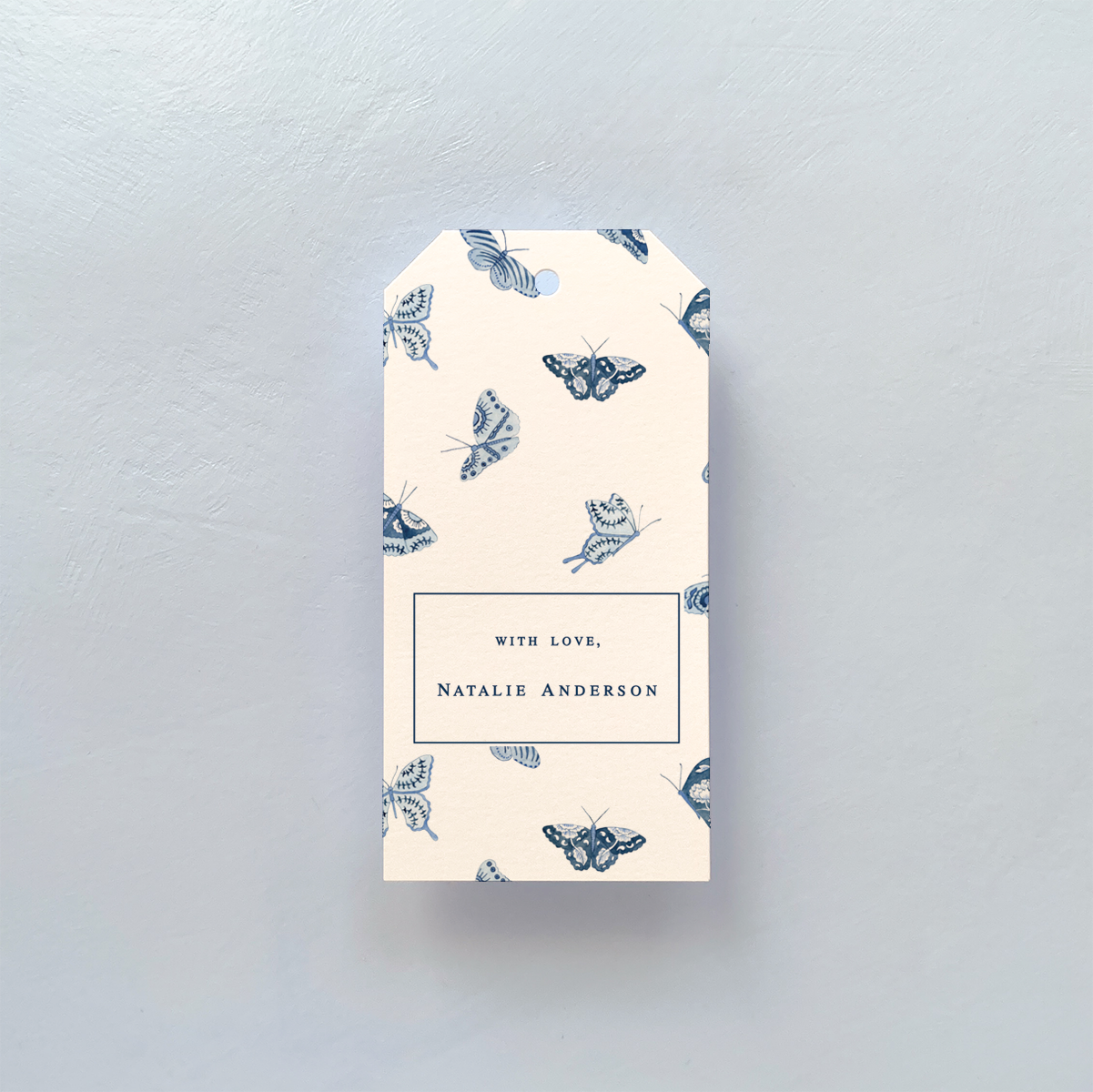 GIFT TAG WITH BLUE AND WHITE BUTTERFLY DESIGN